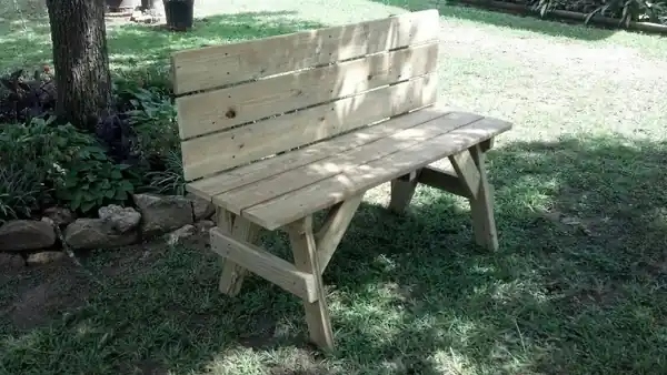 A high-back wooden bench