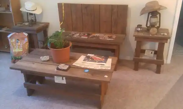 A rough-sawn coffee table and bench set