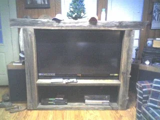 A television stand made from barn-style wood