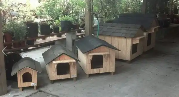 Clark's Woodwork houses on display in a garden center